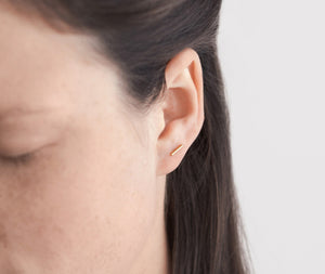 A single bar sterling silver line stud earring